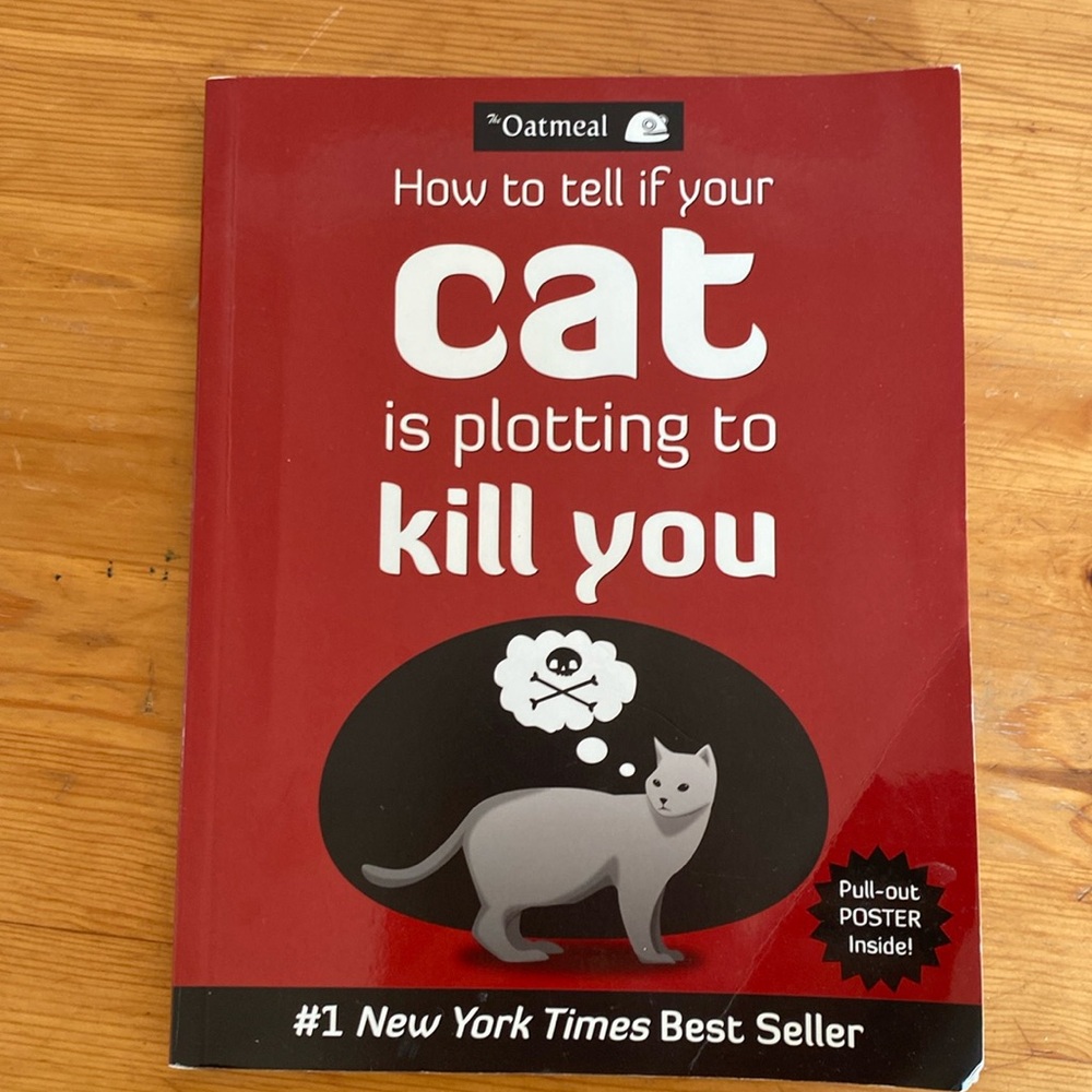 3 for 15$! “How to tell if your cat is trying to kill you”Book by the Oatmeal.